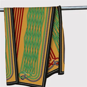 Detail of French silk scarf featuring geometric rope patterns and polka dot edges