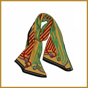 Detailed view of geometric chain pattern and hand-rolled edges on a silk scarf