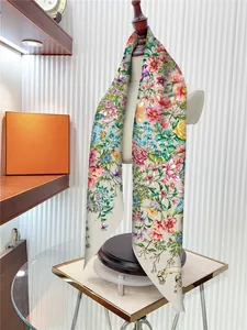 Close-up of floral print twill silk scarf tied on mannequin neck for fashion styling