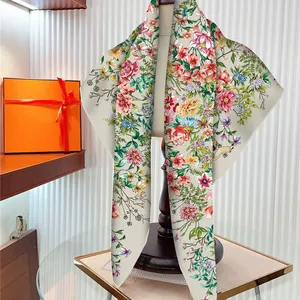French style 90cm floral silk scarf with rose prints displayed on a textured background