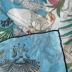 Lightweight sheer georgette scarf with floral and marine prints and hand-rolled edges
