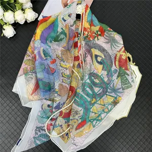 French georgette beach scarf with colorful fantasy print and palm tree illustrations