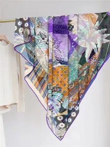 Détail du châle en mousseline à imprimé tropical avec bordure violette cousue