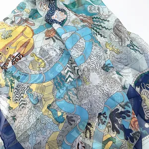 Detailed view of sheer georgette scarf with ocean theme crab shack and seahorse prints