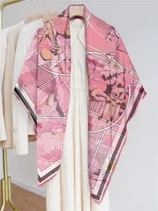 Détail d'un foulard en soie rose avec motifs de bande dessinée sur une robe blanche
