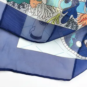 Detail of georgette shawl showing underwater theme prints with seahorse and coral motifs