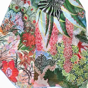 Detail of thin georgette scarf with vibrant jungle floral and zebra print textures