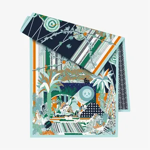 Detail view of the tropical jungle art print with palm trees and sun on a silk shawl