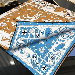 Twill silk square scarf featuring paisley and animal prints with hand-rolled edges
