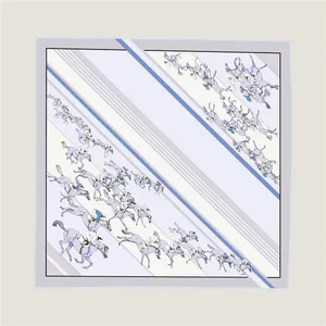 Detailed close-up of horse racing pattern on twill silk square scarf with hand-rolled edges