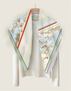 Detail of 90cm horse racing silk scarf showing vibrant equestrian patterns on twill fabric