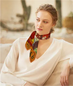 Detail of artistic Van Gogh oil painting style silk twilly scarf worn on model's neck
