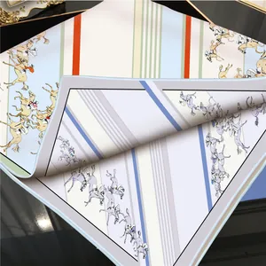 Silk twill square scarf featuring equestrian horse print and hand-rolled edges