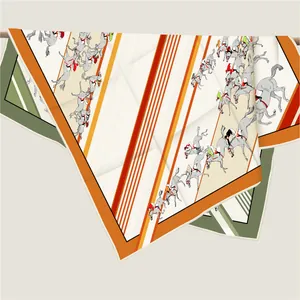 Detailed close-up of a twill silk square scarf featuring equestrian horse racing patterns