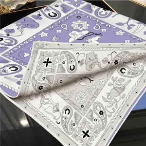 Double-sided paisley silk scarf with animal print and hand-rolled edges in purple and black