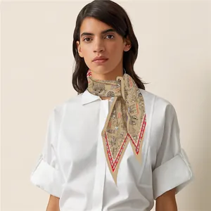 Detailed view of silk twill diamond scarf featuring vintage nautical map print tied at neck
