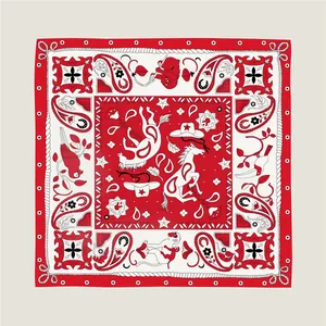 Detail of 90cm square silk scarf featuring Western motifs like horses and paisley patterns