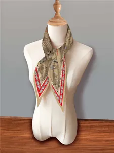Detailed view of nautical map print scarf with red paisley border and sailing ship motifs