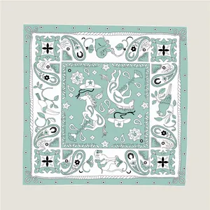 Detail of 90cm twill silk scarf with mint green paisley and western cowboy patterns
