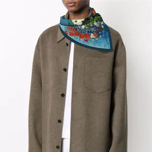 Navy blue Van Gogh style floral silk square scarf paired with a brown wool shirt jacket