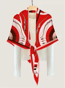 Detailed close-up of retro bow and arrow pattern silk scarf on white shirt