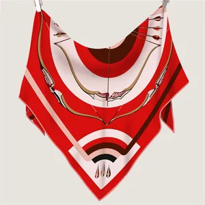 Elegant red silk triangle scarf with geometric bow pattern and high-quality texture