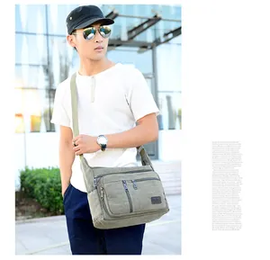 Army green canvas crossbody bag for men featuring multiple storage pockets and durable straps