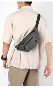 Back view of a grey waterproof crossbody chest bag showing adjustable strap fit
