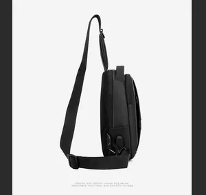 Side view of black oxford chest bag with USB charging port and breathable back mesh