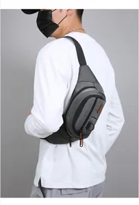 Detail of dark grey multi-layer waterproof waist bag with orange fashion zipper puller