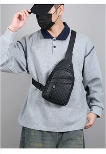 Macro shot of black PU leather chest bag with embossed star pattern on a male model