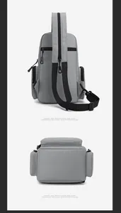 Vue détaillée du sac gris multifonction montrant la sangle ajustable et les compartiments