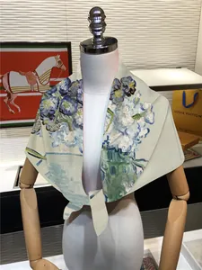 Detail of silk scarf with Van Gogh Irises painting print on white mannequin