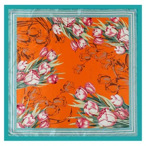 Carré de soie de 90 cm avec motifs de tulipes éclatants et bordure bleue contrastante