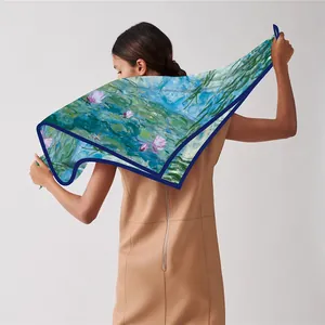 Monet Water Lilies impressionist silk scarf shawl displayed on back of a female model