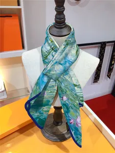 Detail of Monet silk scarf featuring Water Lilies print and premium rolled edges