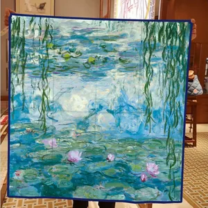 Monet Water Lilies print silk-like square scarf held open to show impressionist art