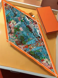 Macro shot of tropical garden print silk scarf featuring premium orange gift box
