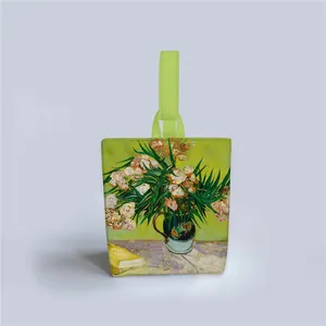 Detail of Van Gogh Oleanders art print on green canvas tote bag with woven handles
