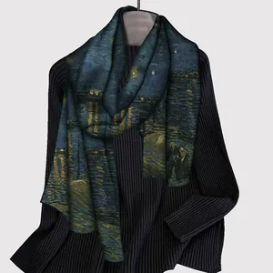 Artistic silk-feel scarf featuring Van Gogh Starry Night print on deep blue sweater
