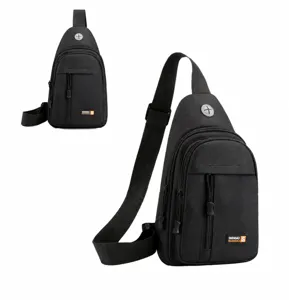 Detail view of black oxford sling bag showing earphone jack and adjustable strap