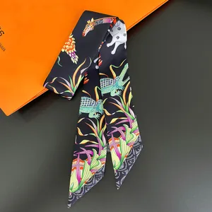 Detailed pattern of elephants and giraffes on a black twilly silk scarf for women