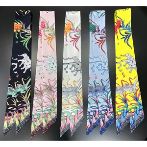 Versatile twilly scarves with elephant floral patterns in black, pink, blue, and yellow