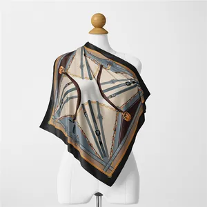 Detailed view of the vintage belt and chain pattern on a 53cm square silk scarf