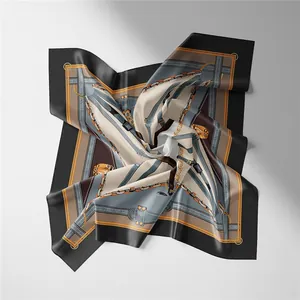 Detailed view of square silk scarf with vintage chain and leather belt patterns