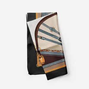 Detailed view of equestrian silk scarf featuring chains and leather strap patterns
