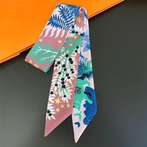 Floral jungle animal print long silk scarf with pink and green botanical patterns