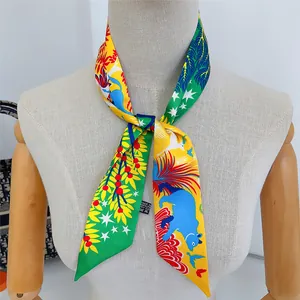 Close-up of a colorful jungle animal print twilly scarf tied on a mannequin neck