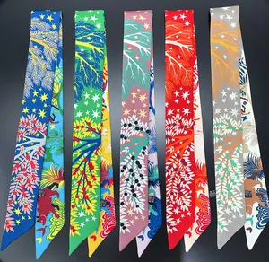 Artistic jungle animal print scarves in vibrant colors shown in an organized flat lay
