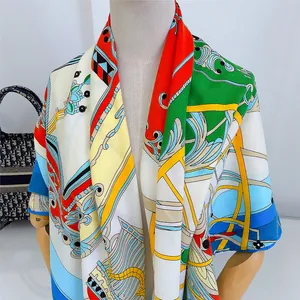 Detail of elegant European palace style silk scarf with vintage carriage and scroll patterns